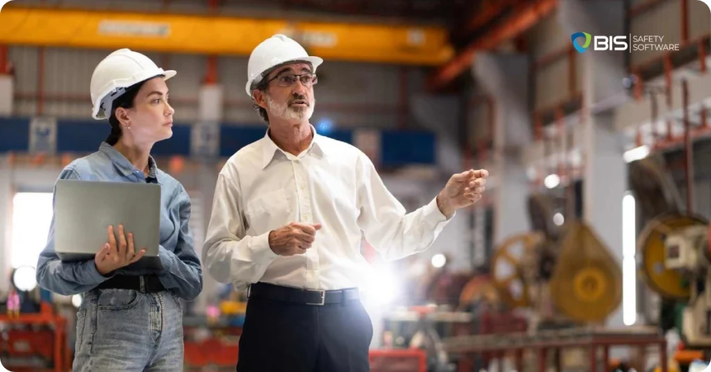 Employees discussing how to enhance safety in the workplace.
