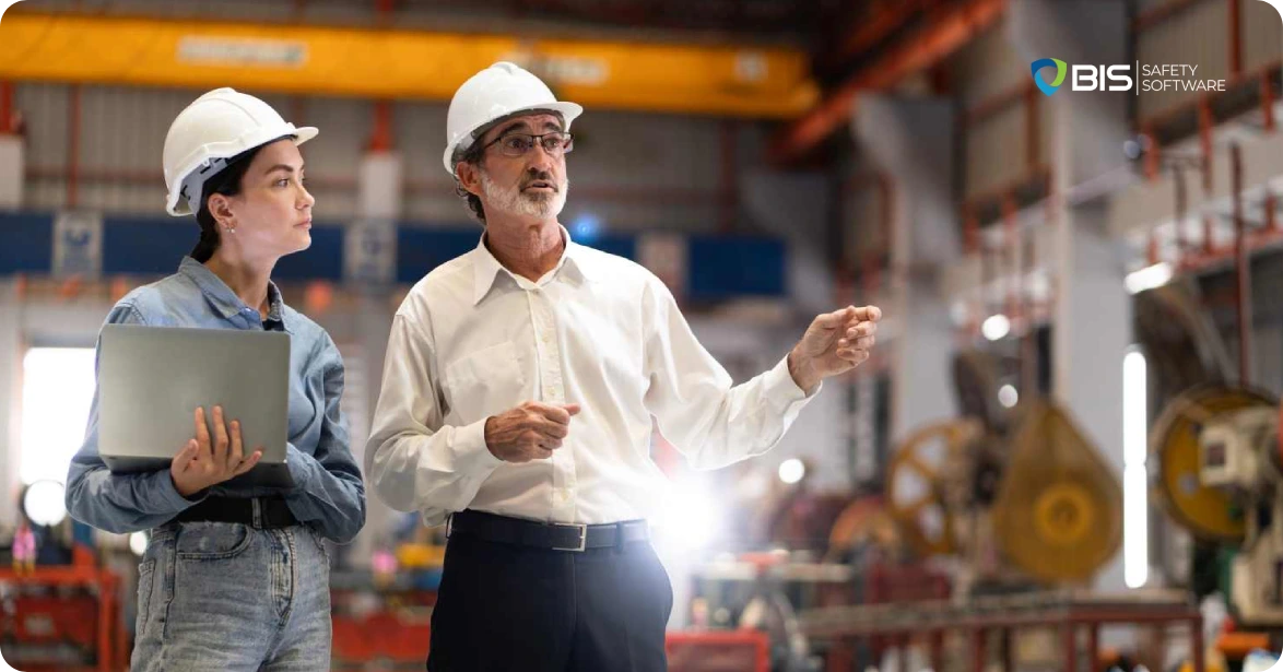 Employees discussing how to enhance safety in the workplace.